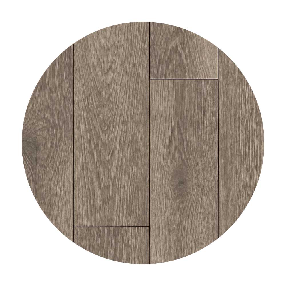 Vinylboden in grauer Holzoptik – moderner Bodenbelag für passende Sockelleistenkombination.